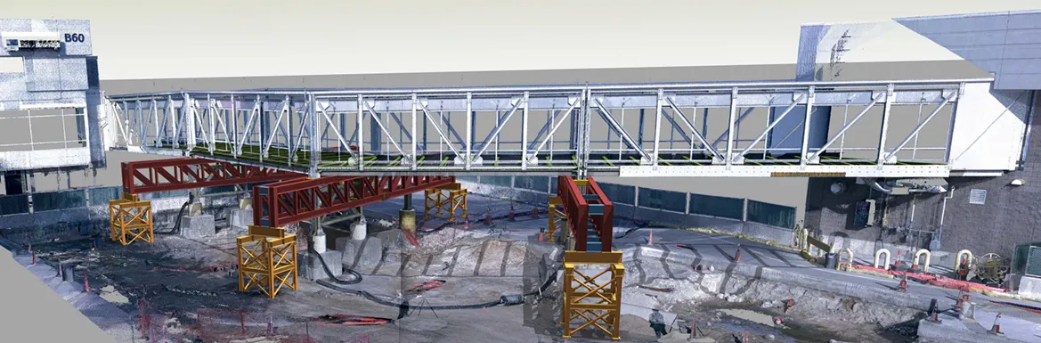 Point-cloud scan and 3D model of an enclosed pedestrian bridge being installed between two buildings